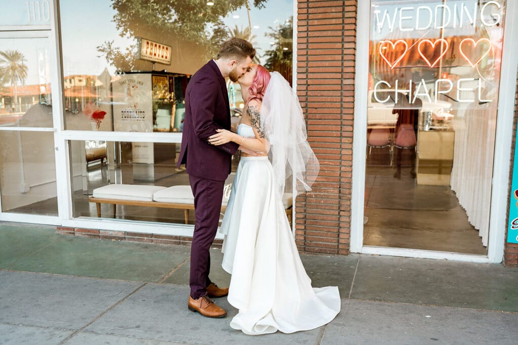 bride and groom kissing after their first look