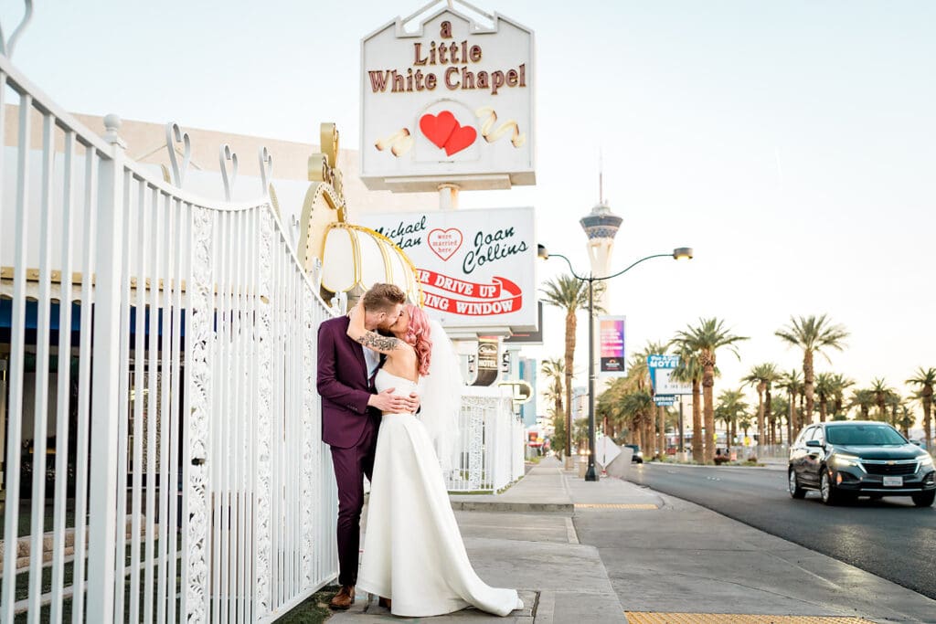 bride and groom kissing during their bridal photos