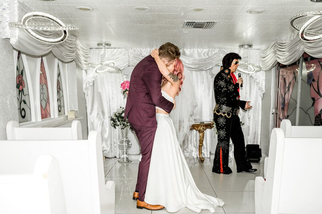bride and groom kissing after their ceremony