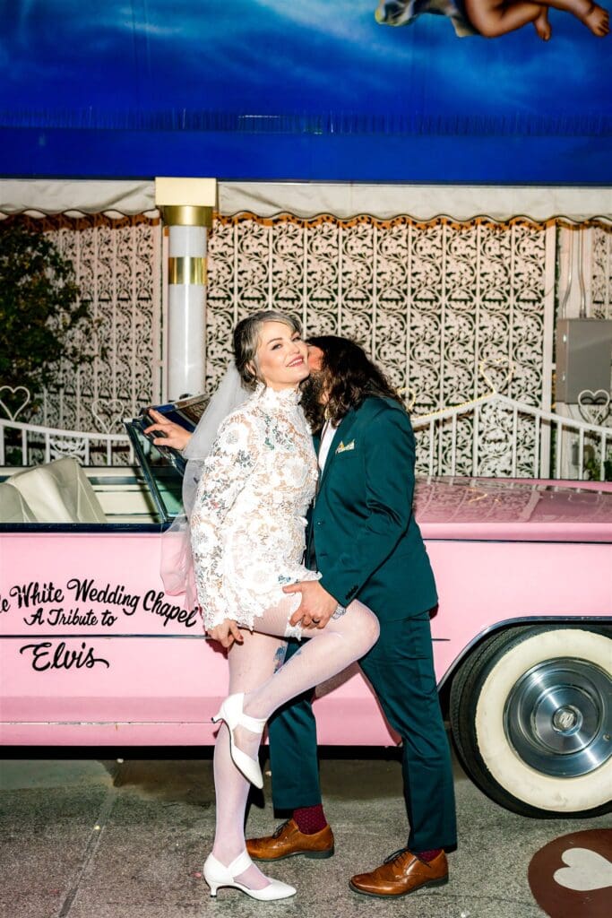 Groom, kissing the bride on the cheek