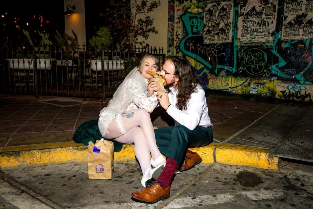 Couple celebrating their elopement with Taco Bell