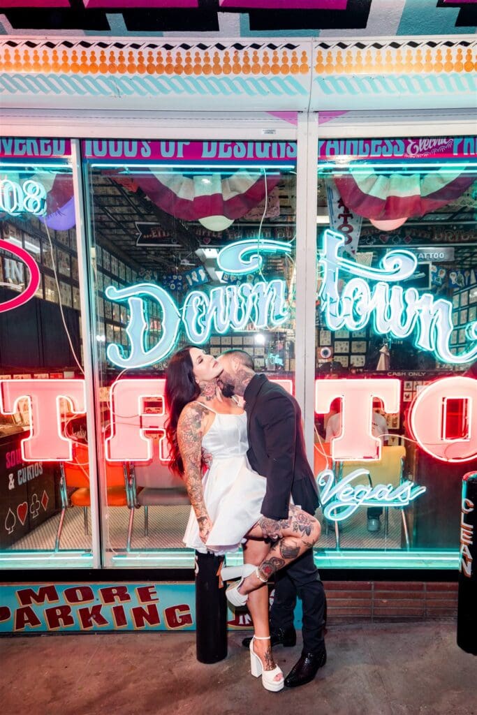 groom kissing the bride on the cheek