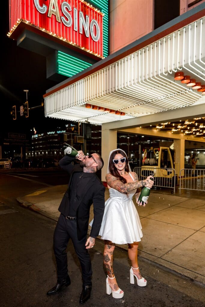 couple drinking champagne during their photoshoot