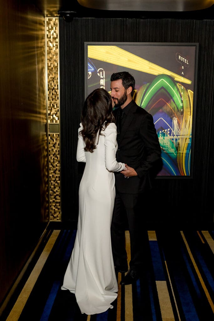 cute picture of the bride and groom kissing