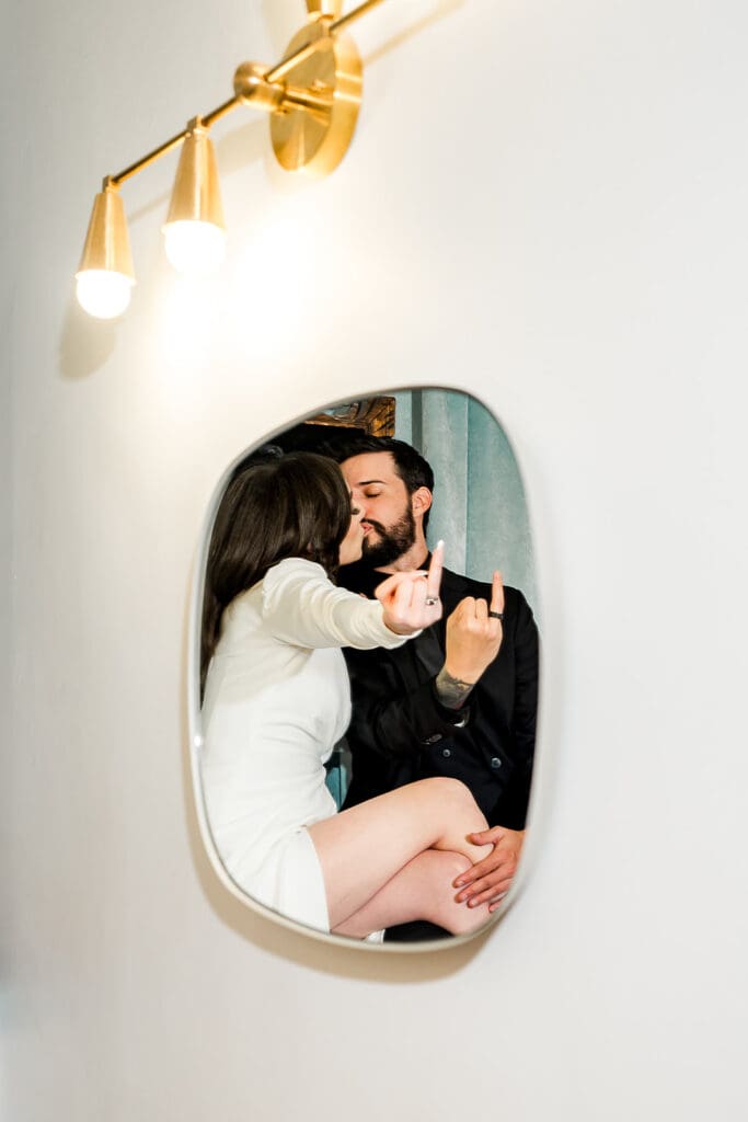 picture of the newlyweds showing their wedding rings