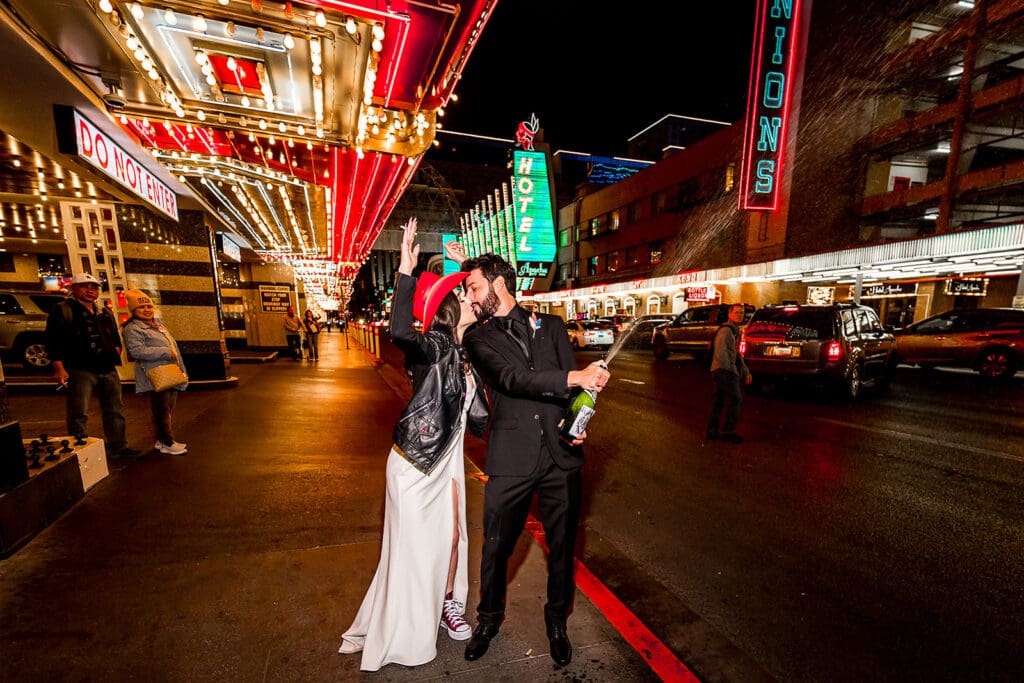 couple celebrating their elopement with champagne